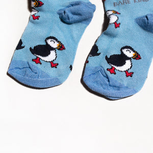 toe closeup flat lay of blue bamboo puffin socks for kids