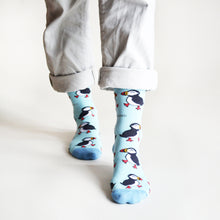 front view of walking model wearing puffin bamboo socks