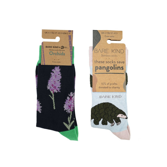 Two pairs of socks with packaging, one featuring orchids and the other a pangolin, on a white background.