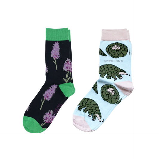 Two pairs of socks with floral and animal designs on a white background