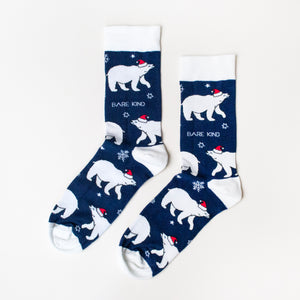flat lay of navy and white bamboo christmas socks in polar bear design