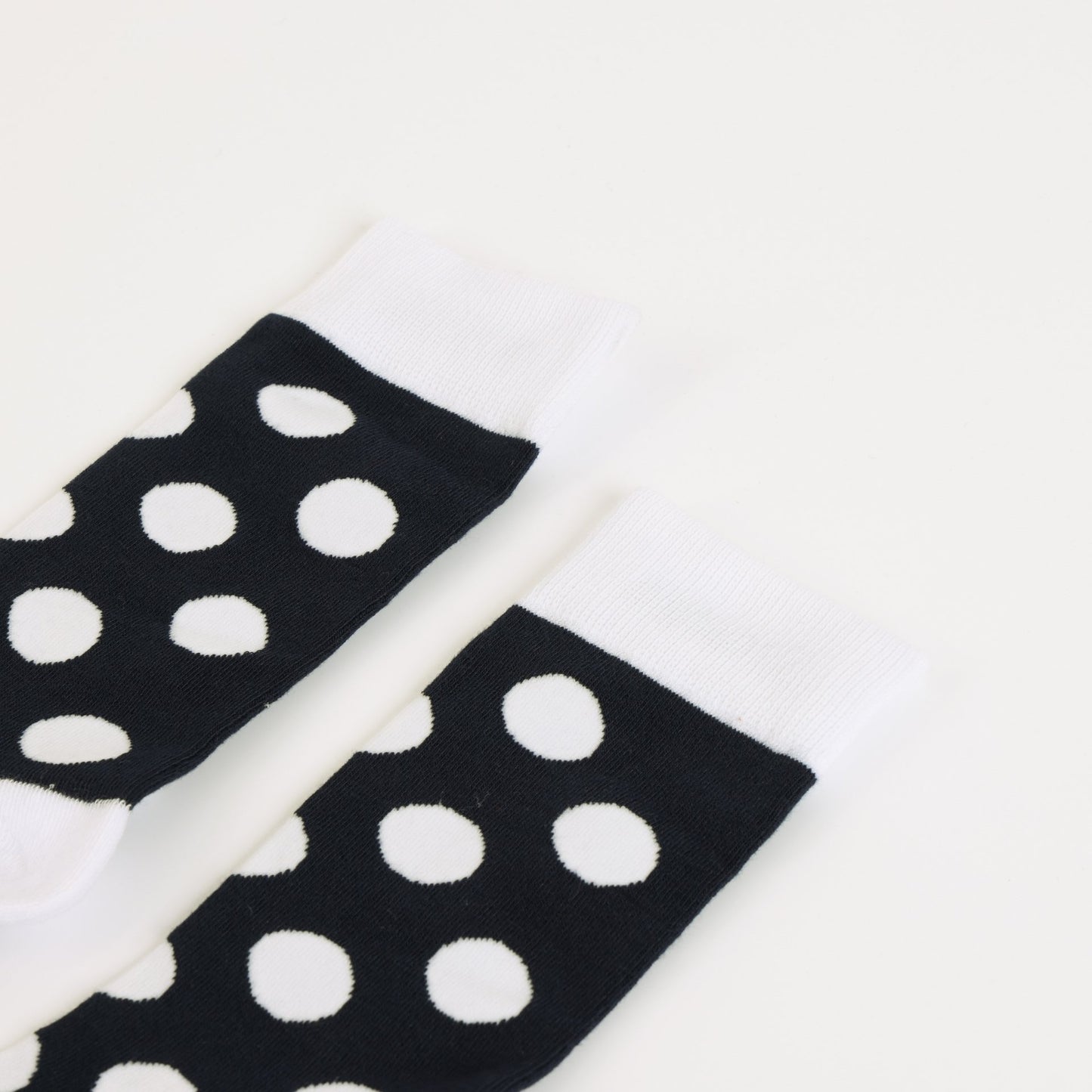Puffin polka dots socks on a white background