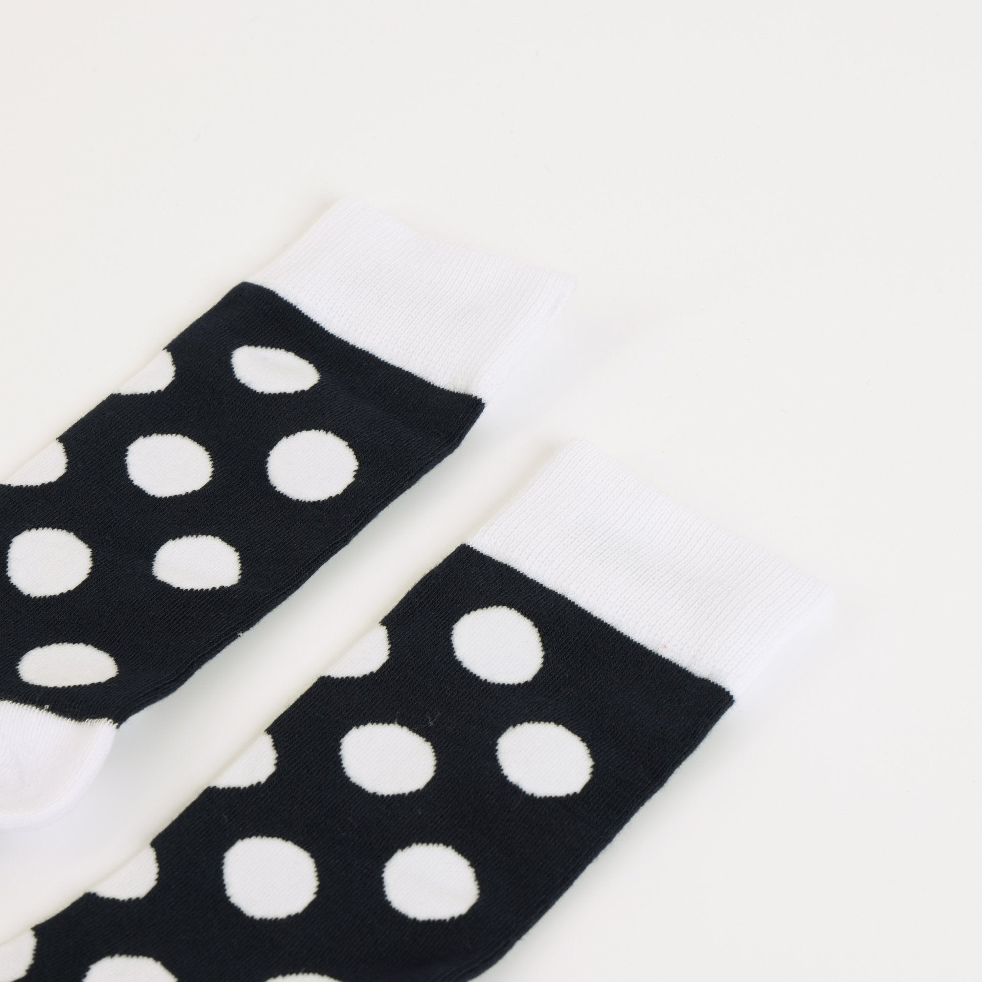 Puffin polka dots socks on a white background