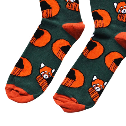 flat lay of dark green bamboo socks with woven red panda design
