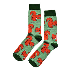 flat lay of green bamboo socks with woven red squirrel design