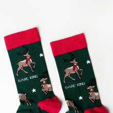 cuff closeup flat lay of christmas reindeer socks