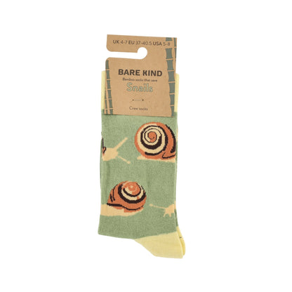 Green sock with snail design and 'Bare Kind' packaging on a white background
