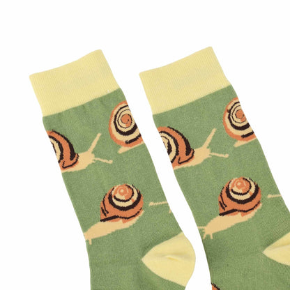 Green socks with snail pattern on a white background