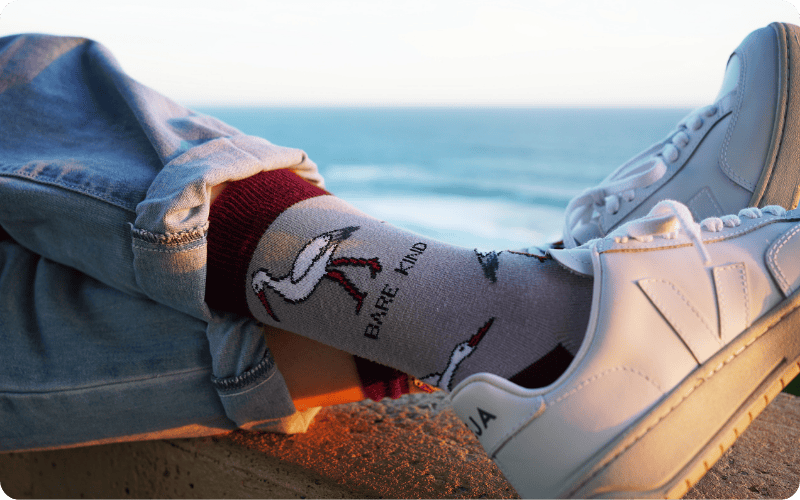 Model wearing Stork bamboo socks