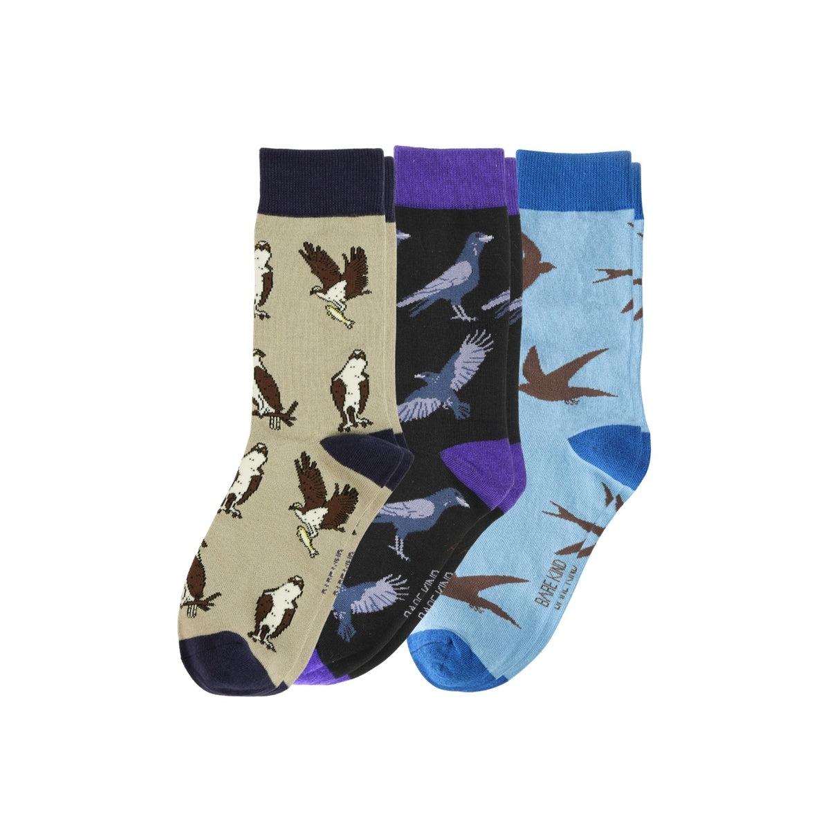 Three pairs of socks with bird patterns on a white background