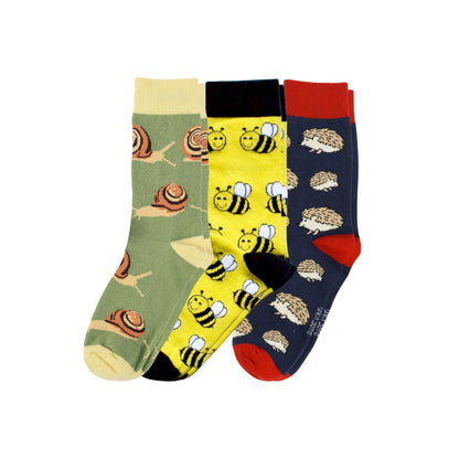 Three pairs of socks with animal patterns on a white background