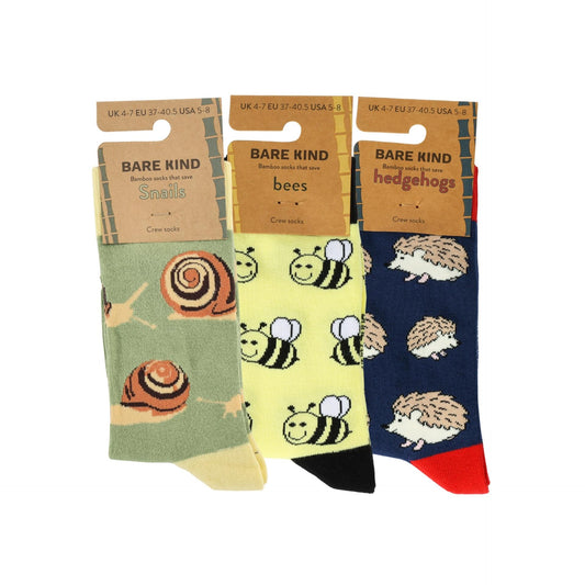 Three pairs of socks with animal designs and 'Bare Kind' packaging on a white background.