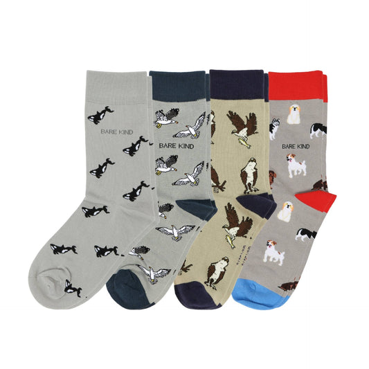 Four pairs of socks with animal patterns on a white background