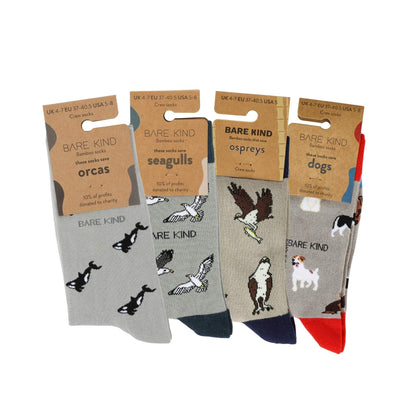 Four pairs of socks with animal illustrations and 'Bare Kind' packaging on a white background
