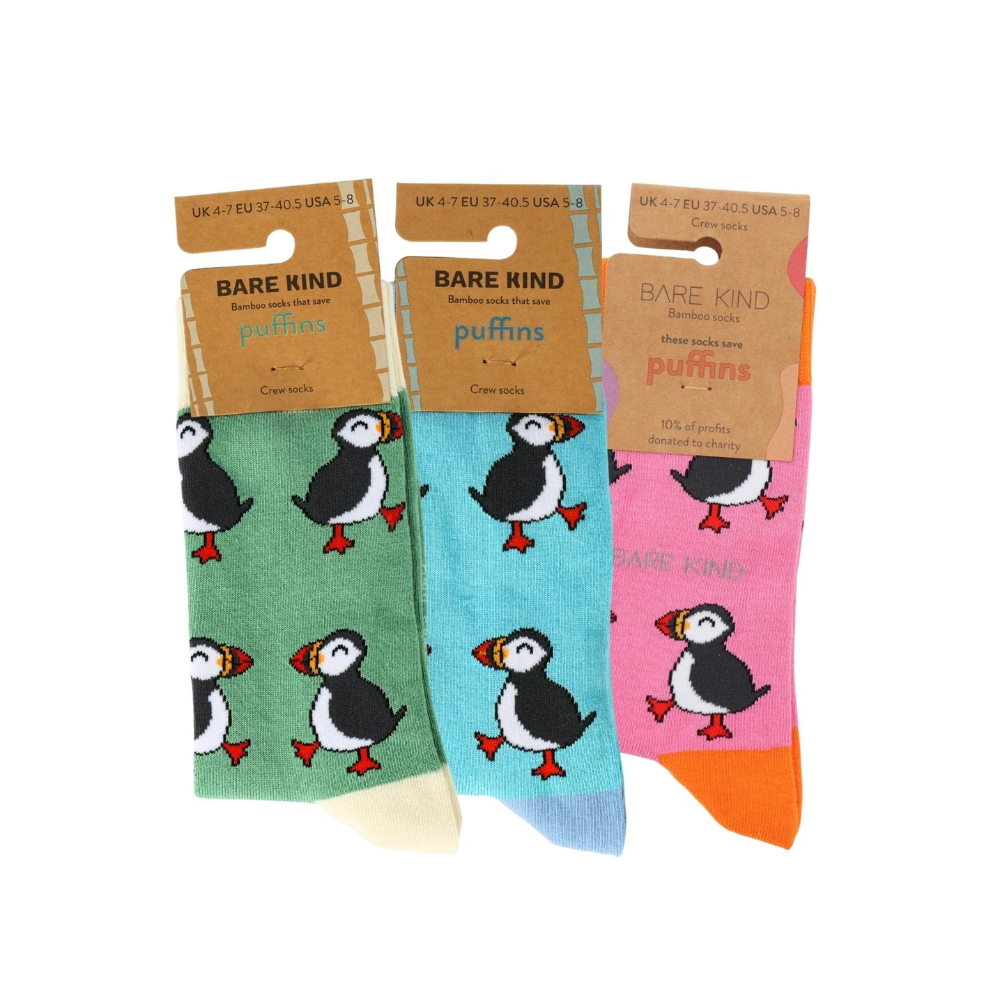 Three pairs of socks with puffin design packaging, labeled 'Bare Kind'.