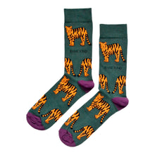 flat lay of green tiger bamboo socks with purple cuff, heel and tow