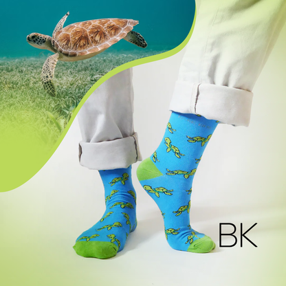 Model wearing turtle bamboo socks with a turtle image