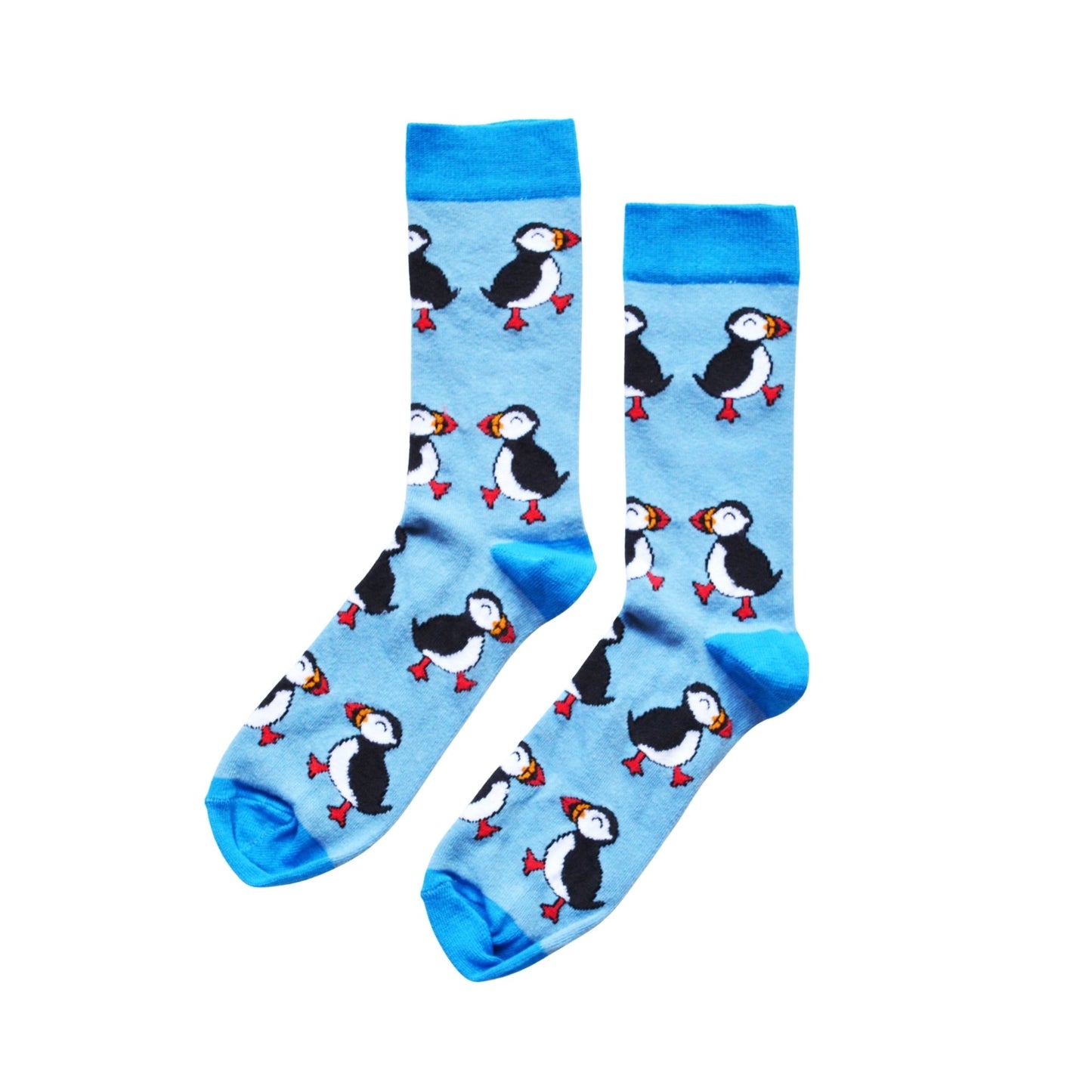 Pair of socks with puffin pattern on a light blue background