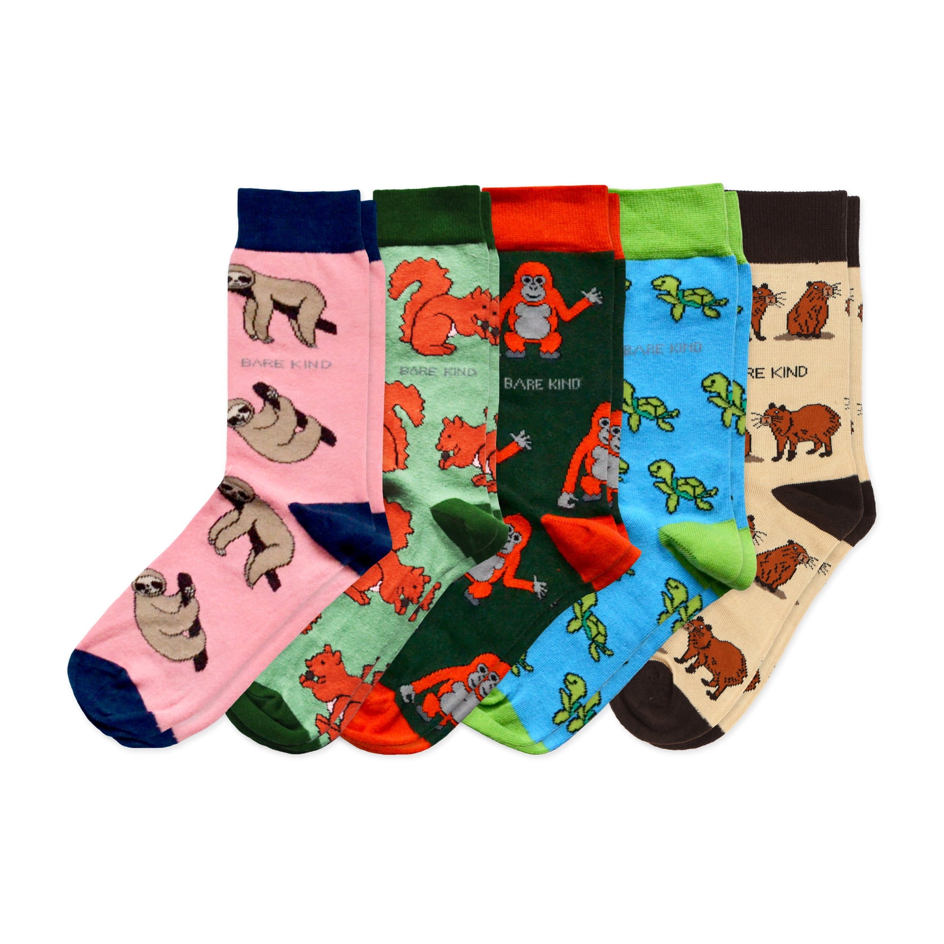 flat lays of pink sloth, green red squirrel, green orangutan, blue turtle, cream capybara bamboo socks