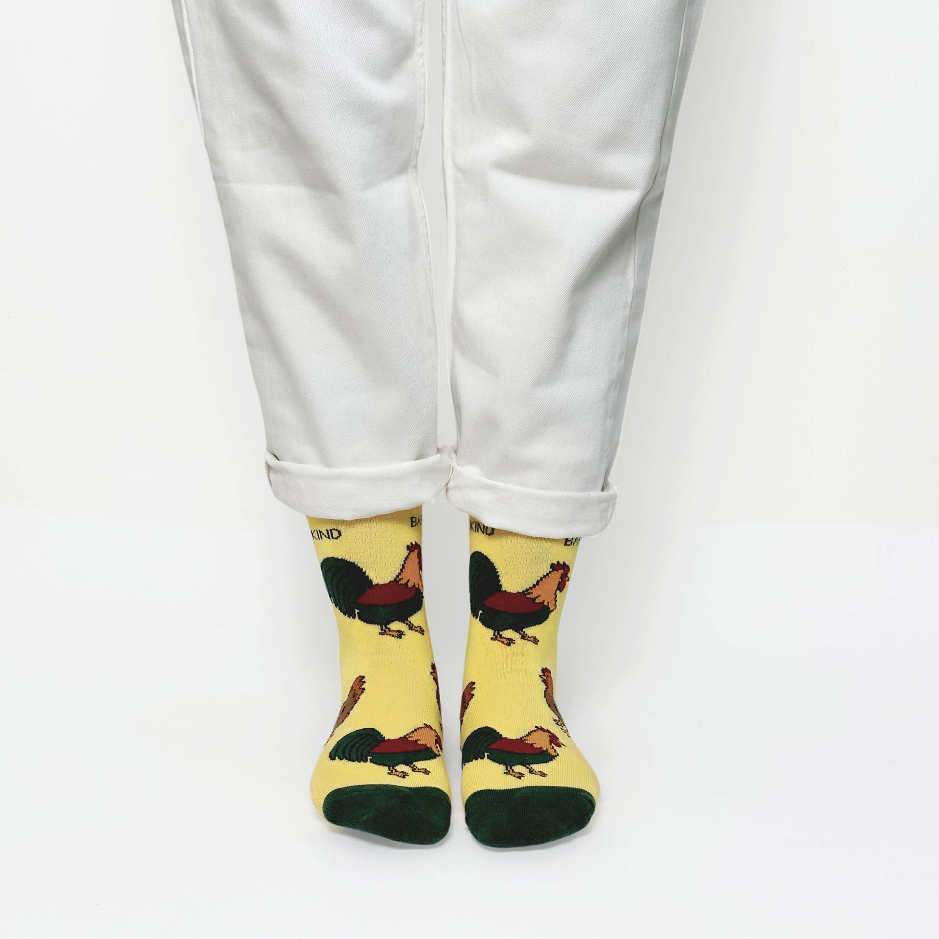 model wearing yellow chicken bamboo socks