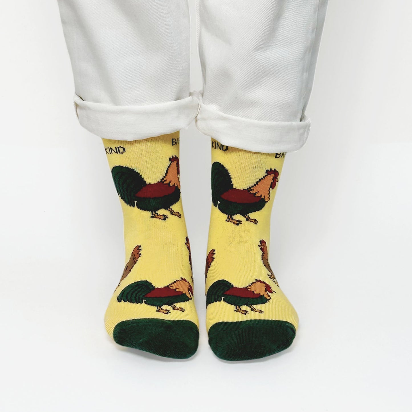 model wearing yellow chicken bamboo socks