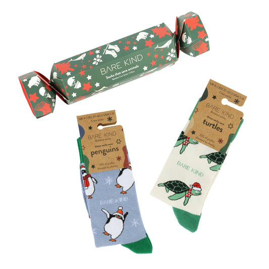 christmas crackers which includes blue green penguins and cream green turtles bamboo socks