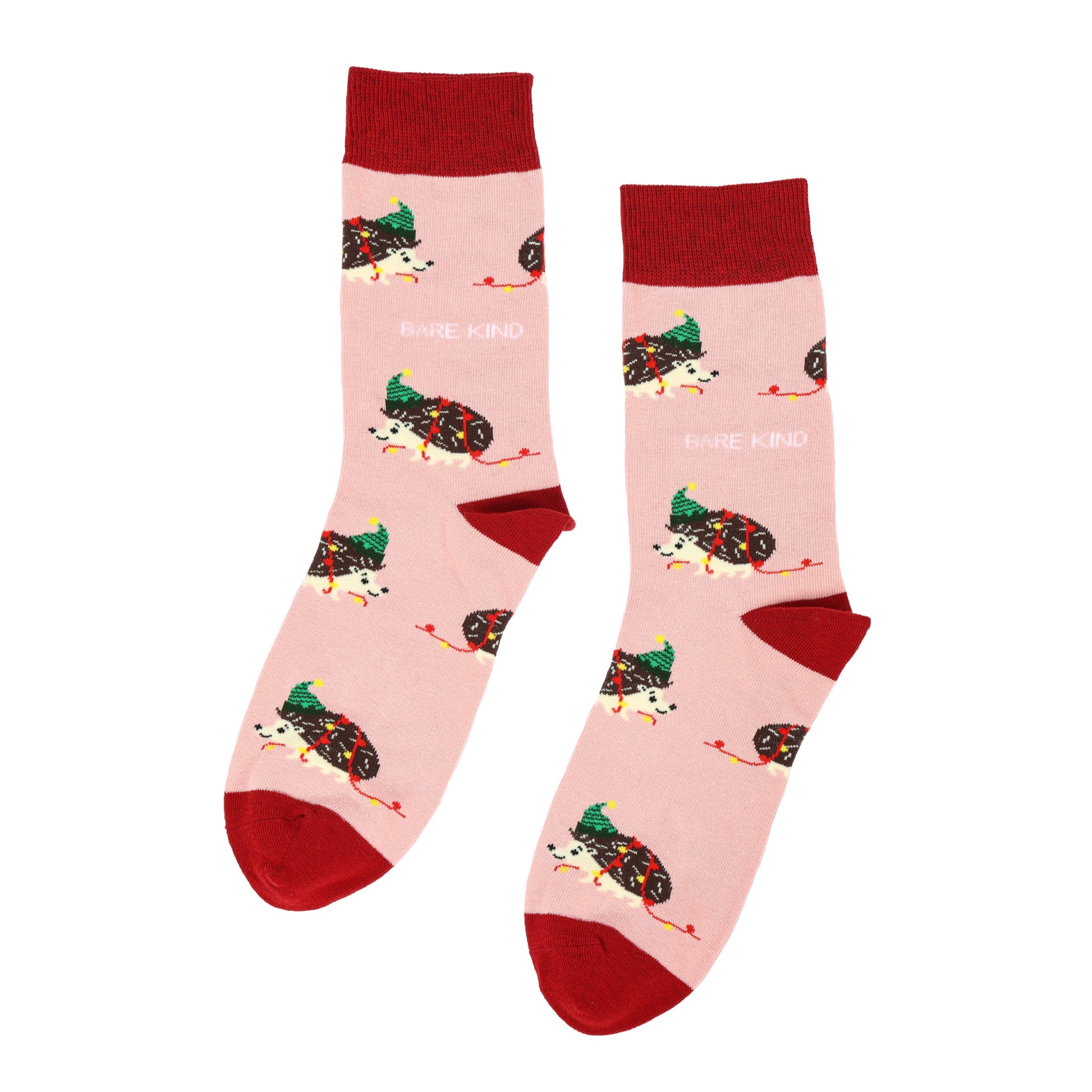 flat lay of pink christmas hedgehog bamboo socks