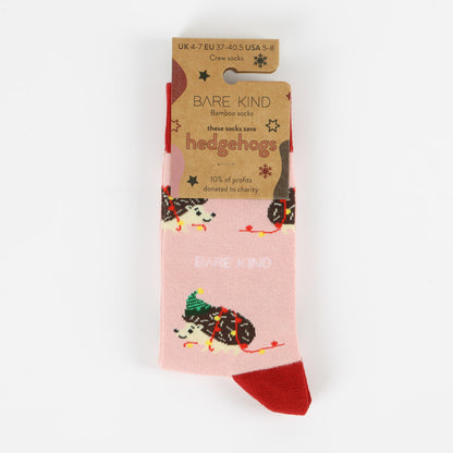 packaging flat lay of pink christmas hedgehog bamboo socks