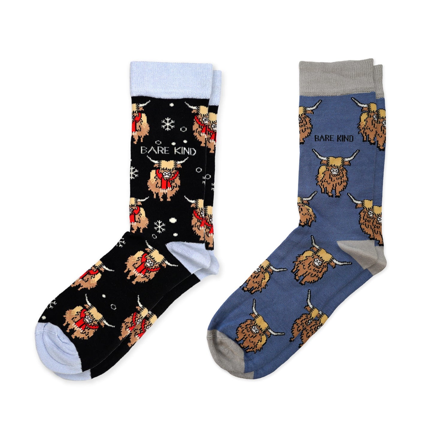 flat lay image of black christmas highland cow bamboo socks and blue highland cow bamboo socks.