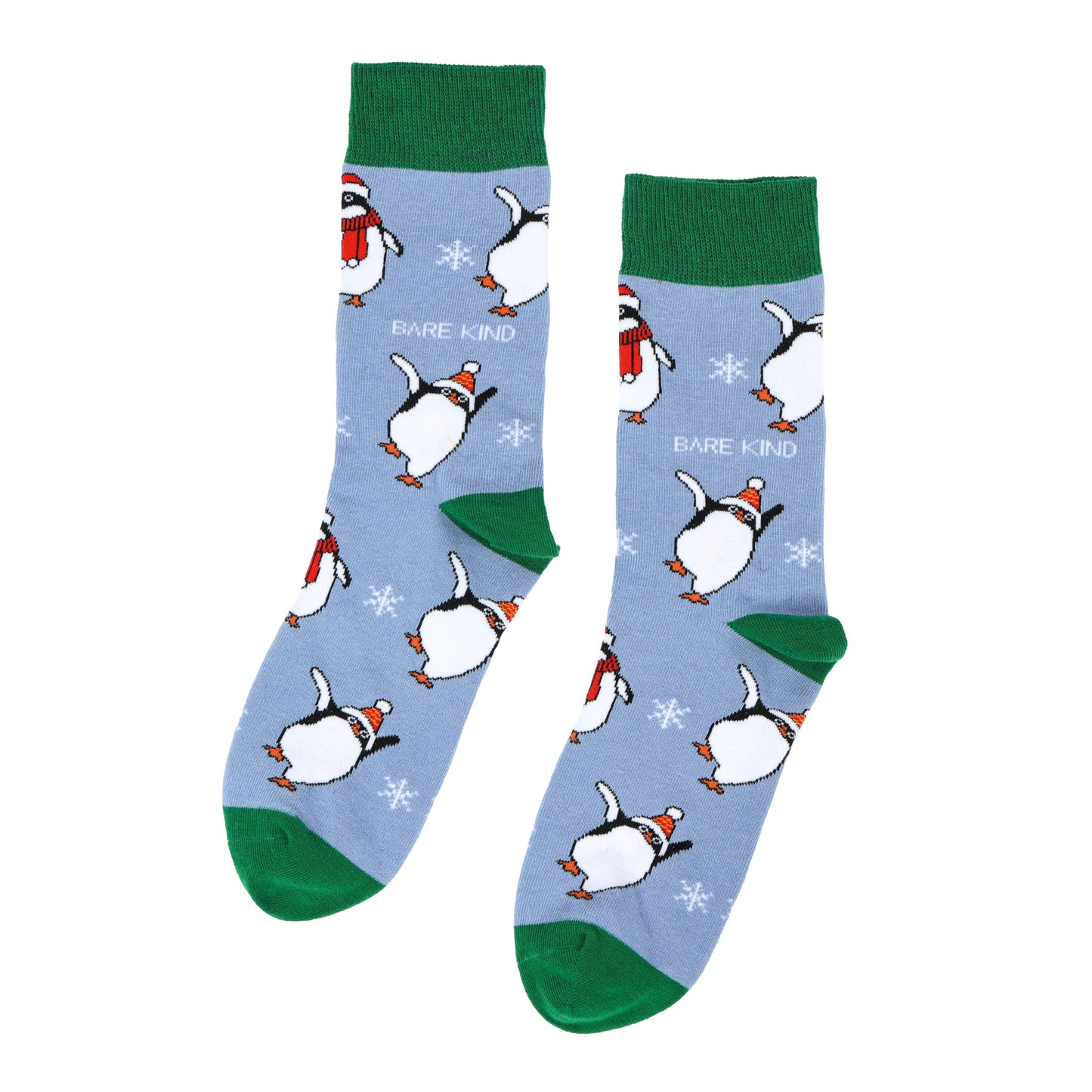 flat lay of blue and green christmas penguin bamboo socks