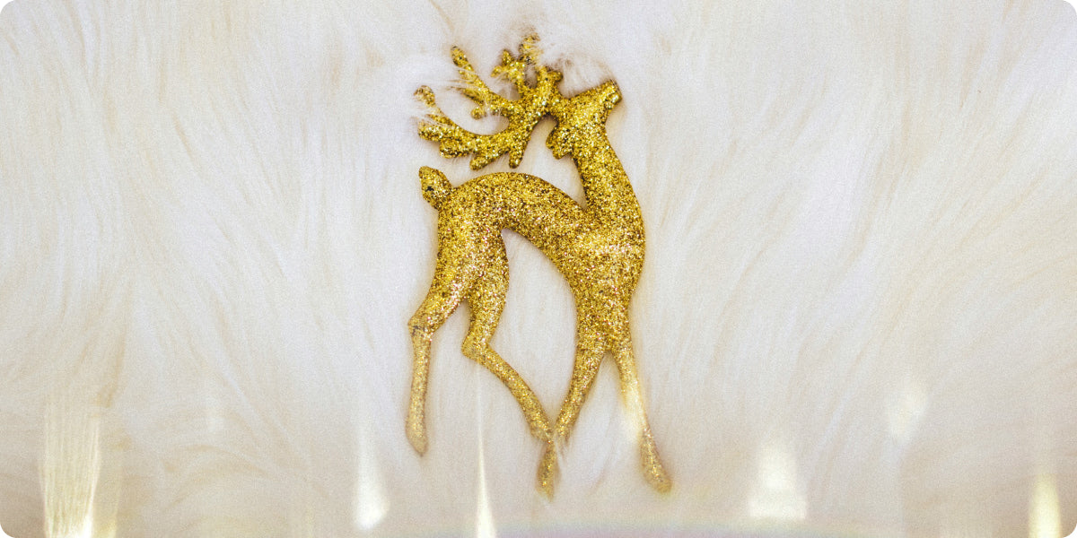 gold reindeer Christmas pin