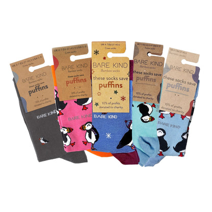 packaging flat lay image of christmas puffin bundle of bamboo socks