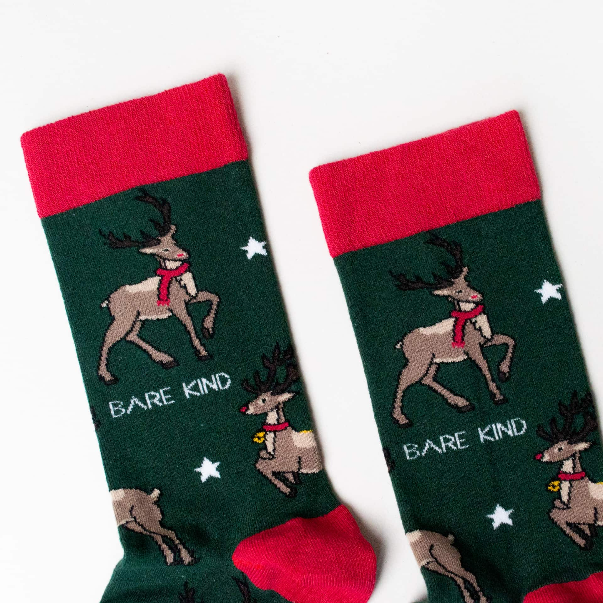 closeup to green christmas reindeer bamboo socks