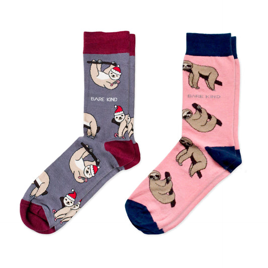 flat lay of bundle containing grey christmas sloth bamboo socks and pink sloth bamboo socks