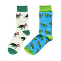 flat lays of blue turtle and cream christmas turtle bamboo socks