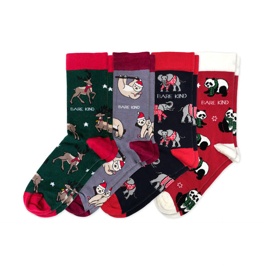 flat lay image of christmas sloth, reindeer, elephant and panda bamboo socks