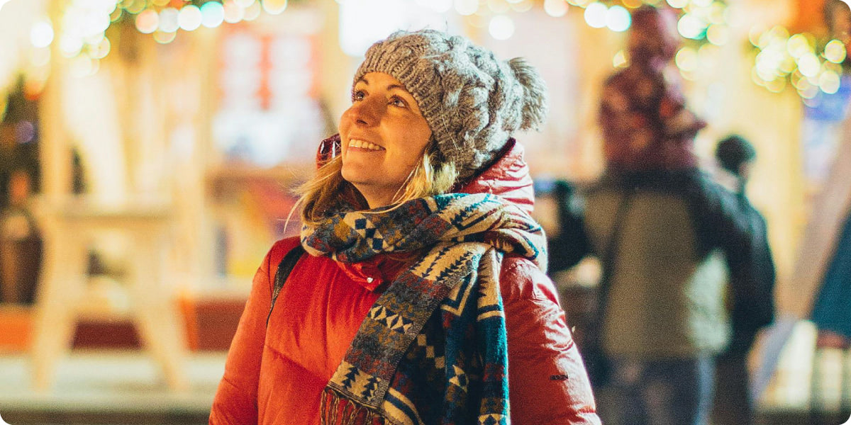 woman wearing colourful scarf on Christmas