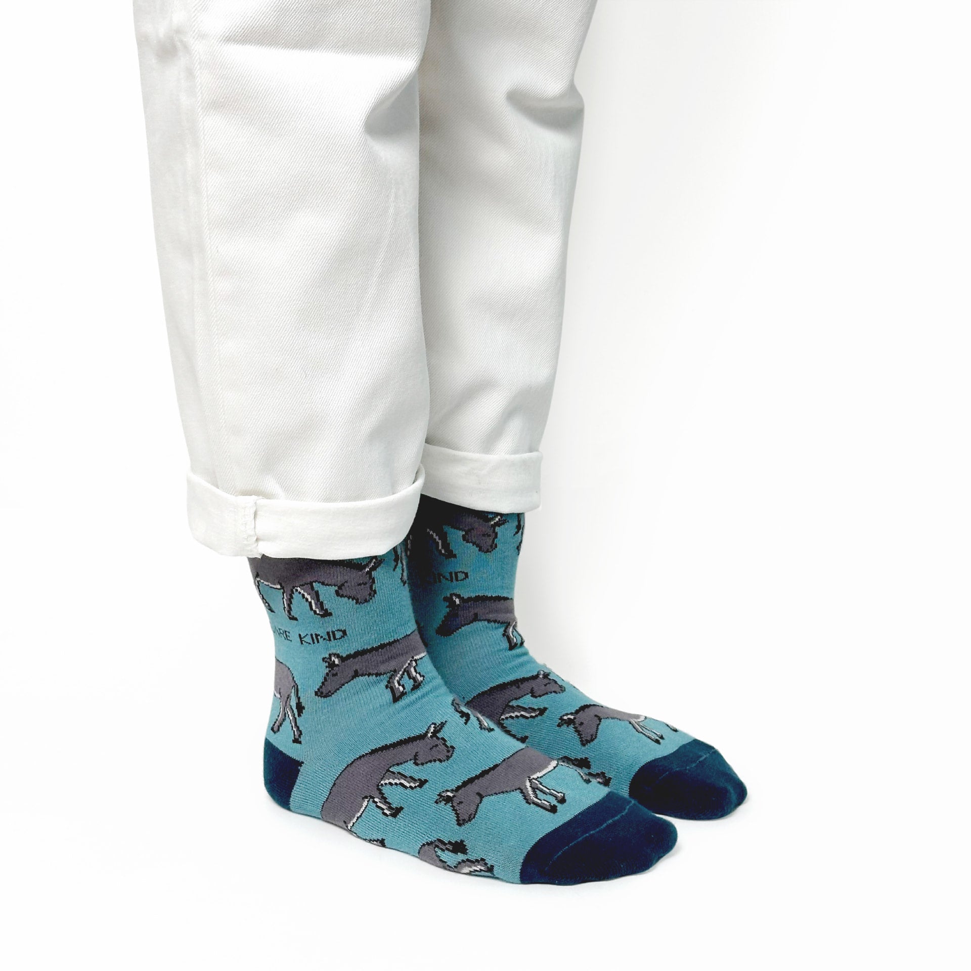 side view of model wearing blue donkey bamboo socks