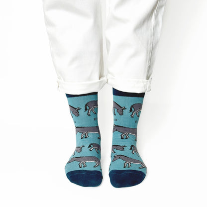 model wearing blue donkey bamboo socks