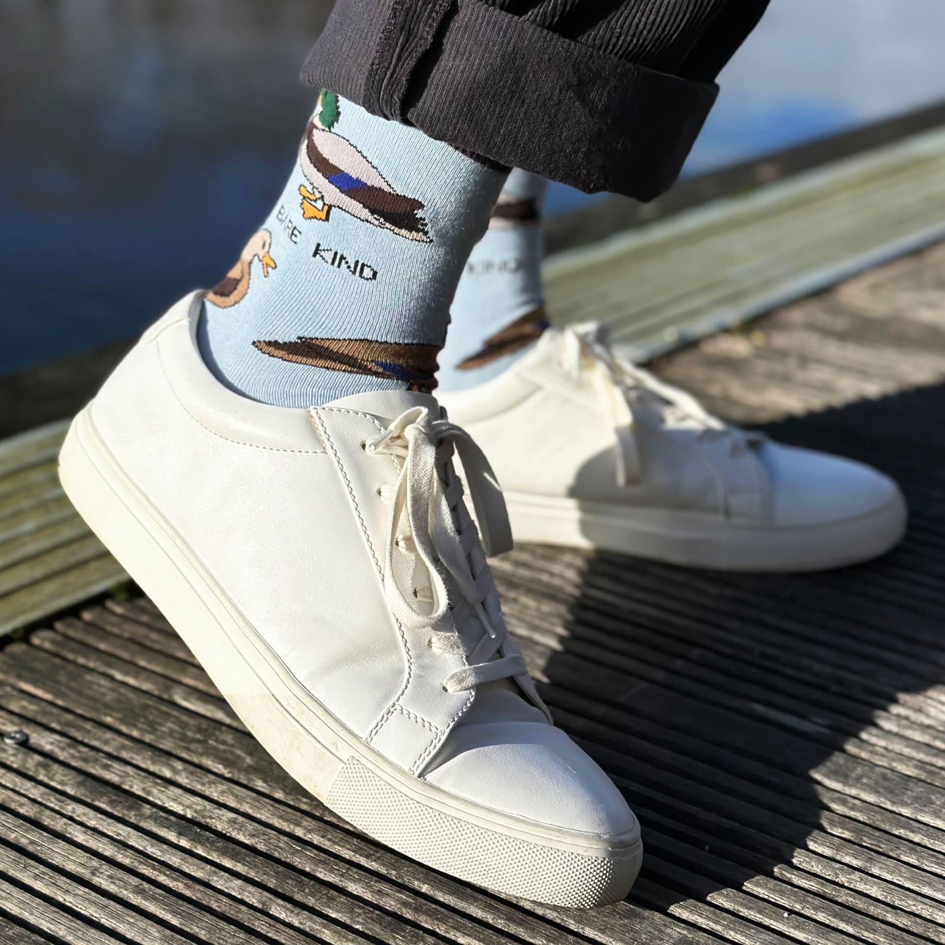 model wearing blue duck bamboo socks