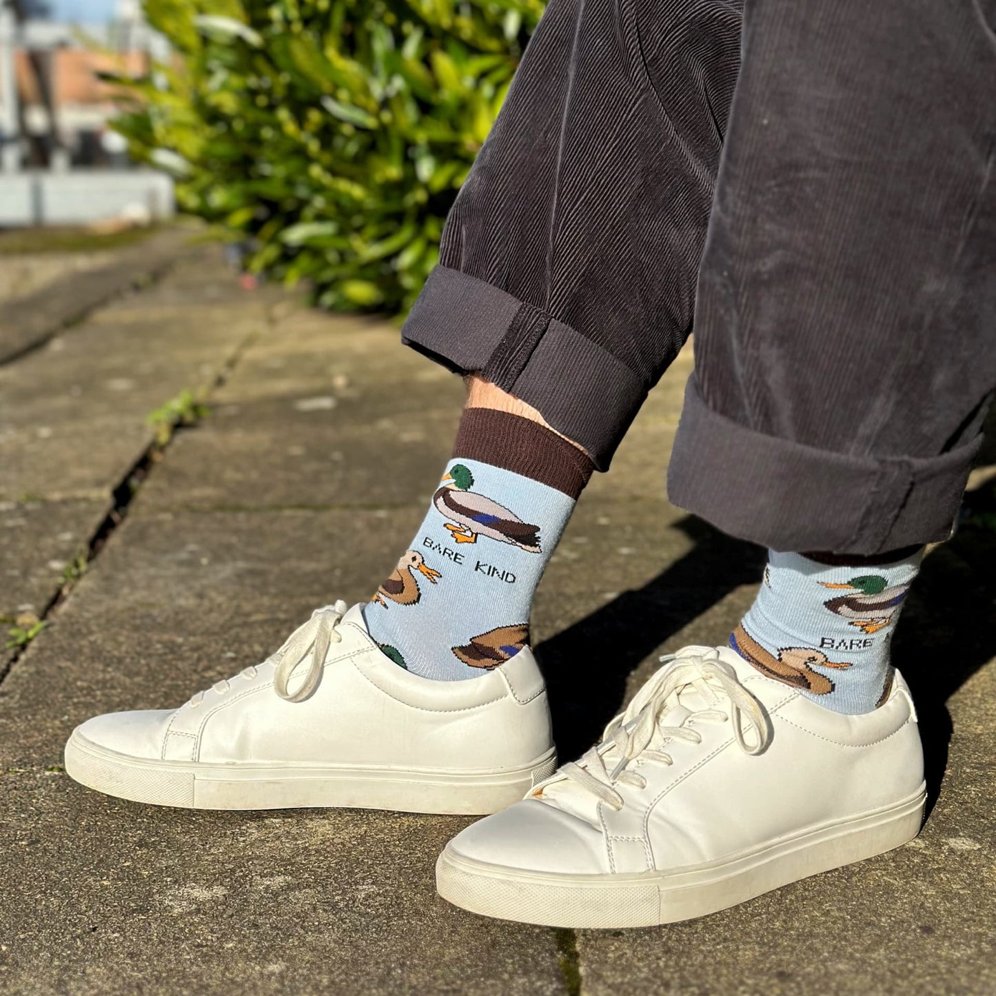 model wearing blue duck bamboo socks