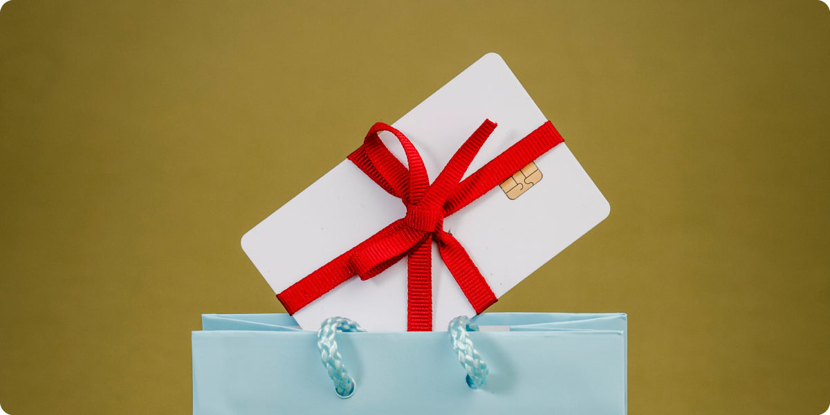 gift card with a red ribbon