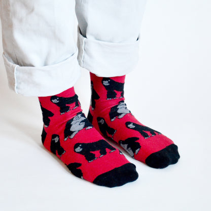 model wearing red black gorilla bamboo socks