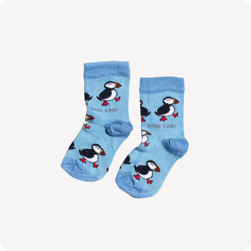 Flat lay of baby blue puffin kids bamboo socks