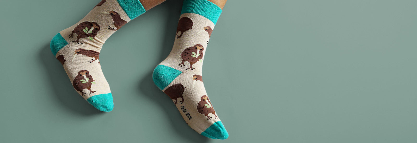 Pair of socks with kiwi pattern