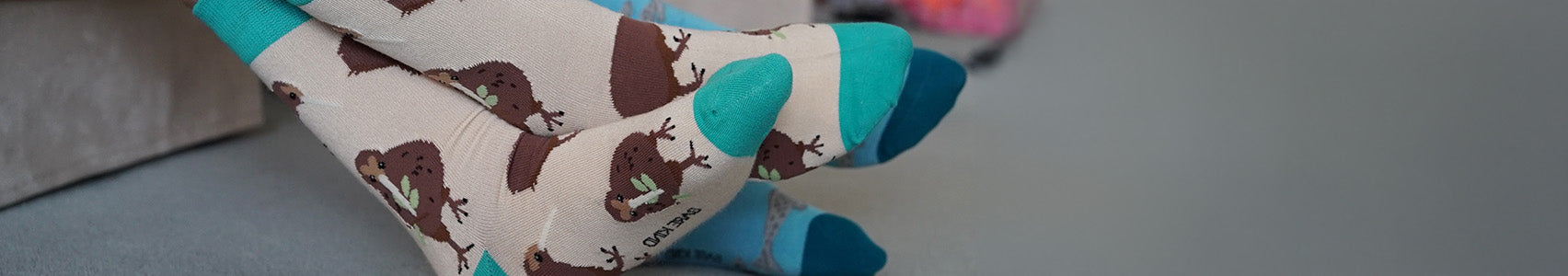 Model wearing Kiwi Socks