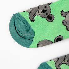 toe closeup flat lay of green koala bamboo socks