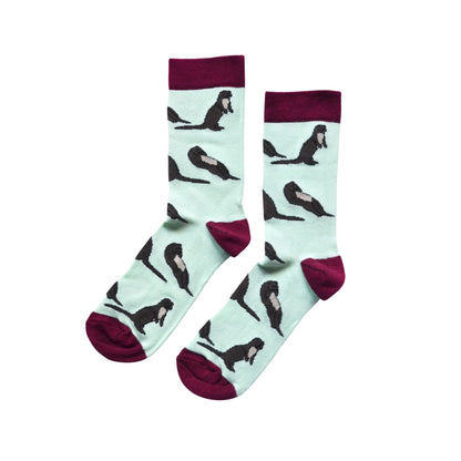 flat lay of light green otter bamboo socks