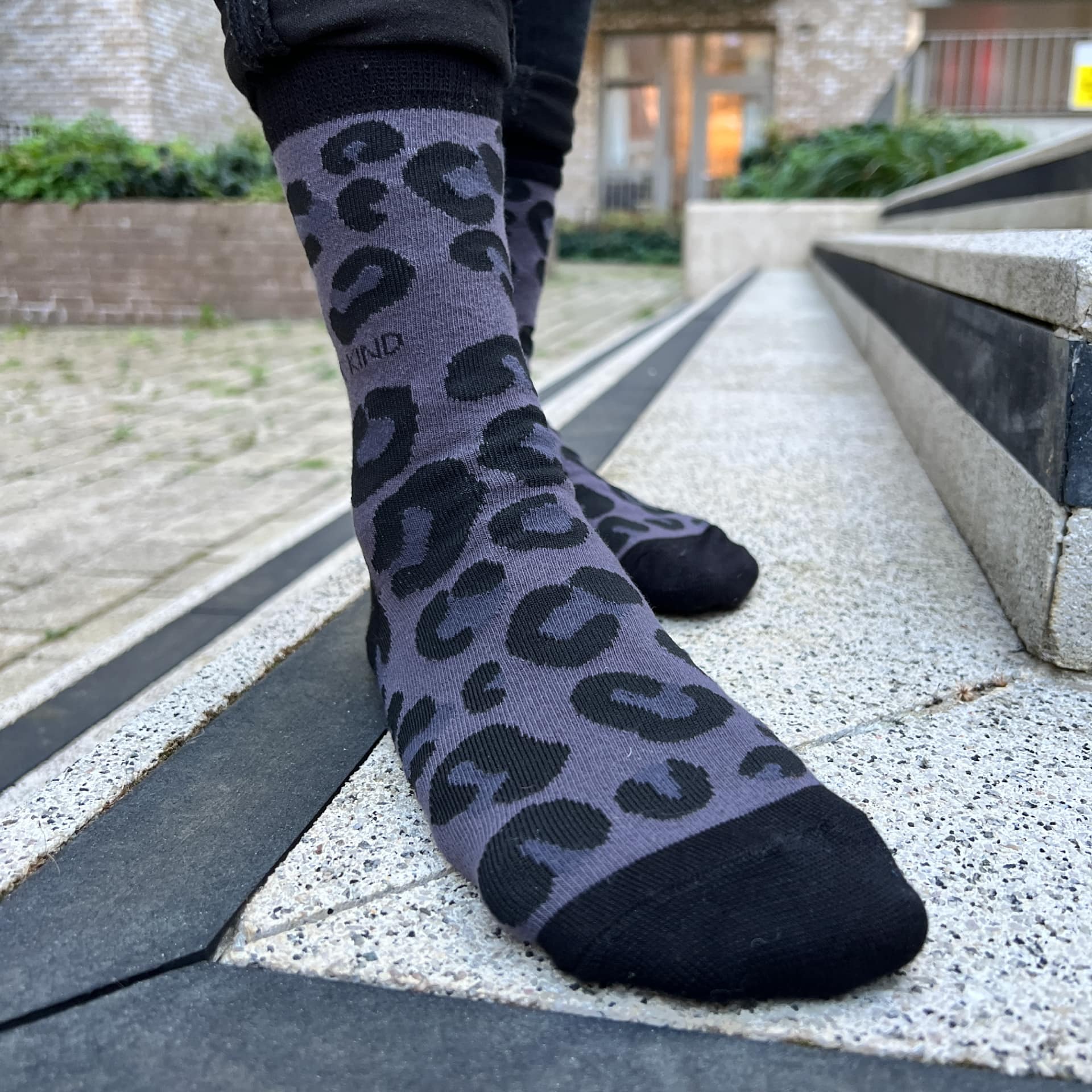 model wearing panther print bamboo socks