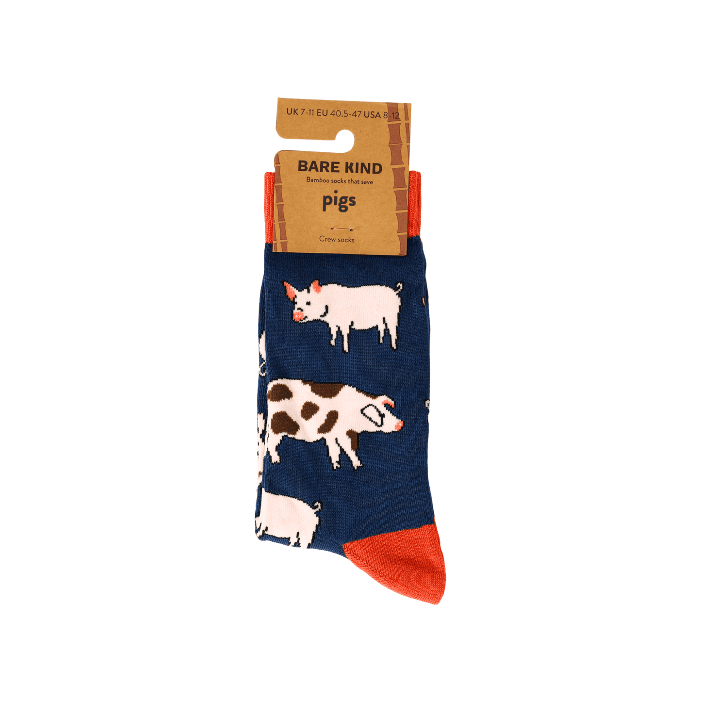 folded flat lay of navy blue pig bamboo socks in 100% recycled cardboard packaging